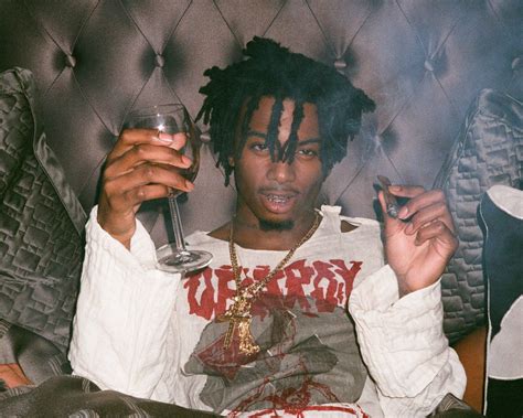 carti middle finger|Carti has the middle fingers up while doing a frontflip.